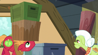 Big Mac lifts a stack of boxes with his head S5E17