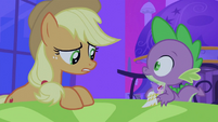 Applejack seeing Spike holding Cadance figurine S2E25