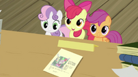 CMC showing the paper with Spike's photo S2E23