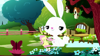 Dawww...a big giant Angel Bunny is brushing her! So cute!