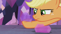 Applejack looks closely at crystal rock S5E20