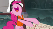 Pinkie Pie carefreely pulls on the map S6E22