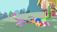 Helps Scootaloo to save her scooter from the greedy Spike.