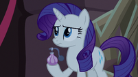 Rarity holding a perfume bottle S8E25