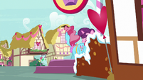 Sugar Belle and Mrs. Cake step out of the bakery S8E10
