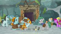 Rockhoof digging with archaeology team S8E21