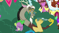 Spike face-palms next to nonchalant Discord S8E10