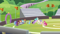 Twilight and friends laughing on the field S9E15