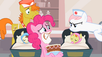 Nurse Redheart is not amused by Pinkie Pie's frosting beard