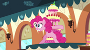 Pinkie Pie protecting the cake S2E24