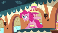 Pinkie Pie protecting the cake S2E24