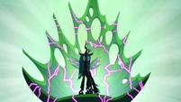 Queen Chrysalis sitting on a cracking throne S6E26