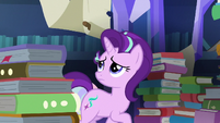 Starlight finds numerous tall stacks of books S7E26