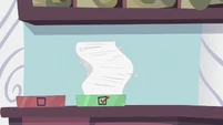 Stack of Princess Dress orders in outbox S5E14