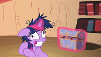 Twilight getting Smarty Pants out of the chest.