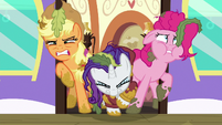 AJ, Rarity, and Pinkie struggling to exit the door S6E22