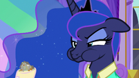 Luna chews on Celestia's travel snacks S9E13