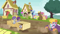 Ponies doing a wave for passing racers S6E14