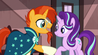 Sunburst holding Starlight Glimmer's hoof S7E24