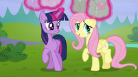 Twilight levitates her and Fluttershy's saddlebags S5E23