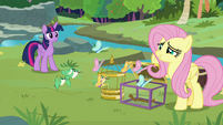 Fluttershy guides birds and butterflies into cages S9E26