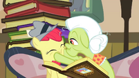 Granny Smith squeezing Apple Bloom's cheeks S2E23