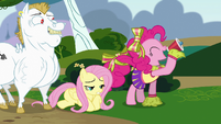 Pinkie Pie cheering with Fluttershy on the floor S4E10