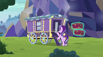 Starlight knocking on Trixie's wagon S8E19