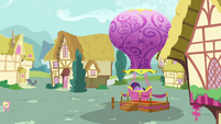 Twilight climbing into the Twinkling Balloon basket S5E23