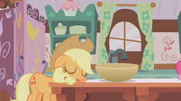 A not-so-well Applejack, about to help Pinkie, make muffins.