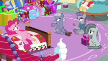 Limestone pointing to a pile of presents MLPBGE.png