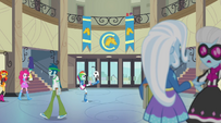 Rainbow Dash bounces a soccer ball through the hall EG2