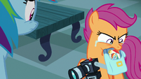 Scootaloo angrily takes out her scrapbook S7E7