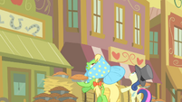 Sweetie Drops and another pony look up at the clock tower S1E21