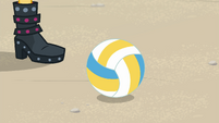 Volleyball rolls next to Sunset's feet EGFF