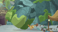 Applejack stops the boulder with her hooves S7E25