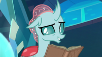 Ocellus reading a reference book S8E26