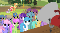 Ponies listen to what Granny Smith has to say.