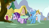 Trixie, let go of Starlight's saddlebag.
