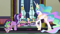 Twilight, Spike, and Celestia look in a classroom S8E1