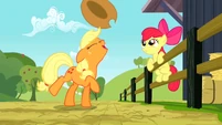 Applejack, tossing her hat.