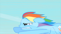 Rainbow Dash biting her lip while flying S1E16
