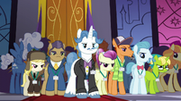Delegates assembled in the summit hall S5E10