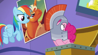 Rainbow looks at Pinkie; Pinkie switches position of knight's helmet out of nervousness S5E19