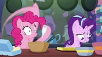 Pinkie Pie adding vanilla to the batter S6E21