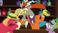 Discord looks at Big Mac through a monocle S8E10