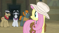 Fluttershy smiling at her new friends S9E21