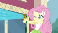 Fluttershy spraying water from a hose EGS1