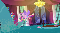 Princess Cadance flying out of the summit hall S5E10