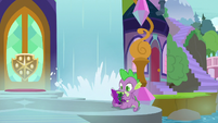 Spike reading a Power Ponies comic S9E5